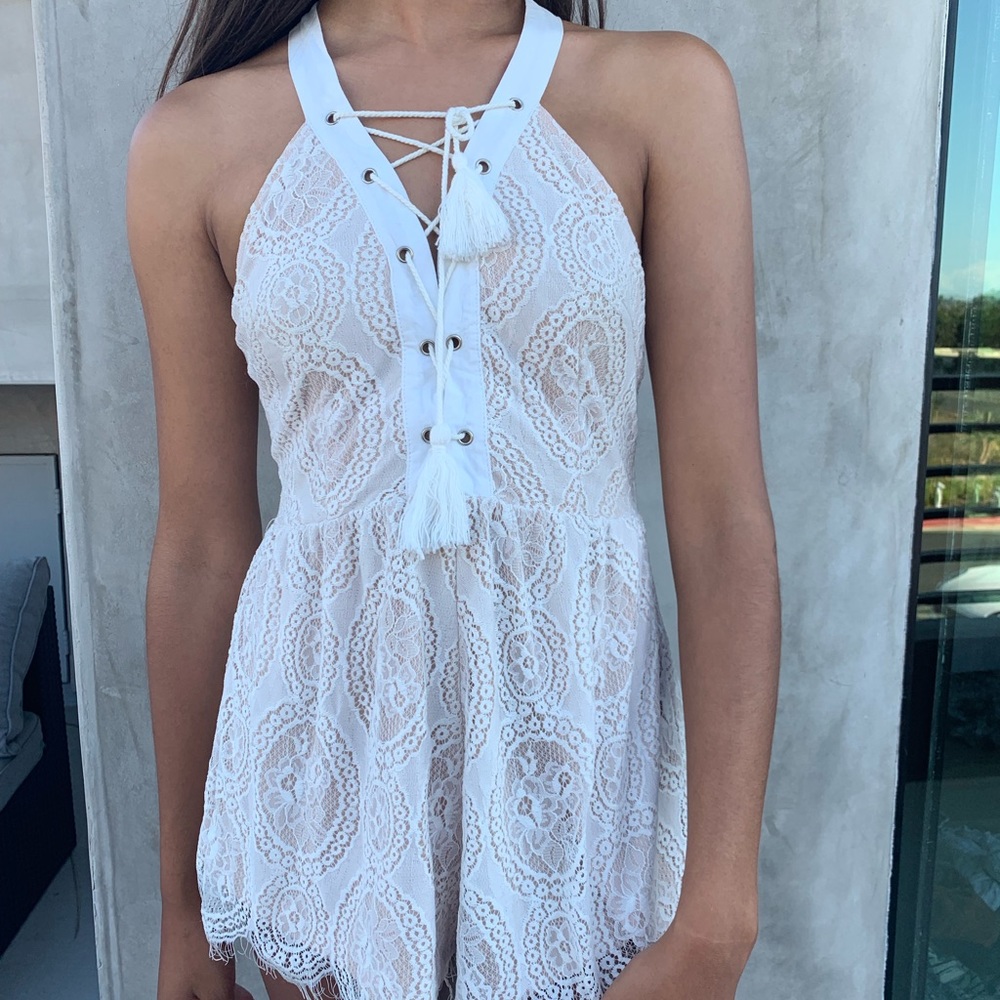 Intricate creme lace romper